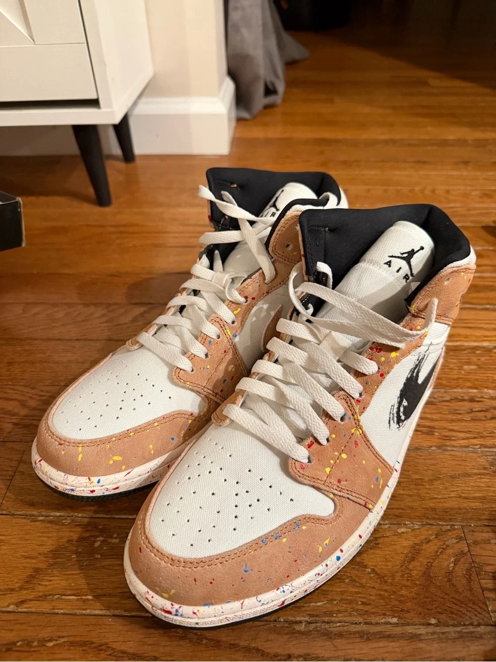 Jordan 1 Mid SE sneakers in sail/black-cider red.